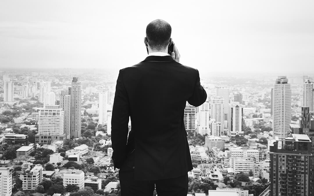 man standing in front of cityscape